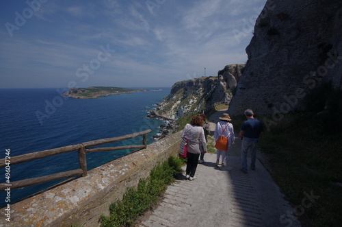 A group of tourists visit the island of San Nicola - Tremiti Islands - Adriatic Sea - Italy photo