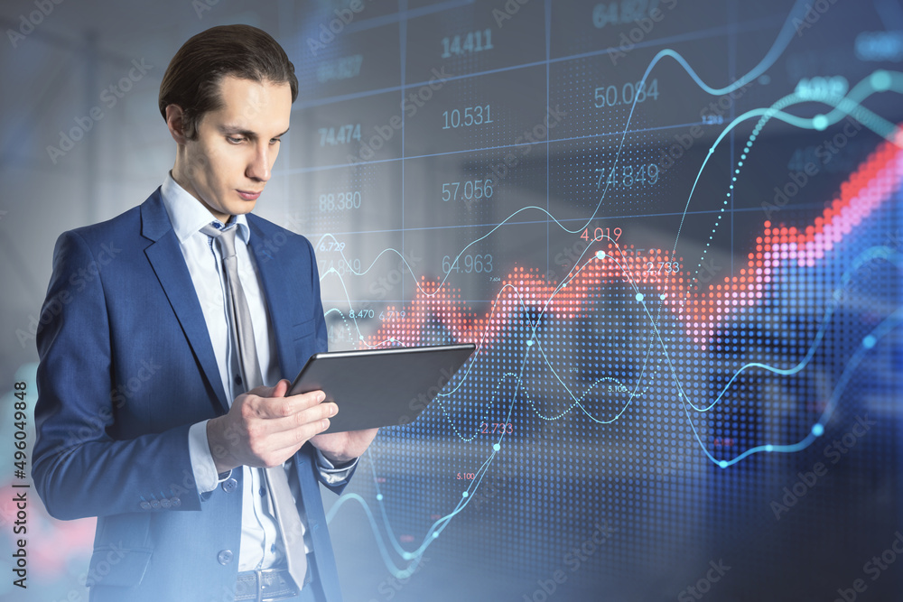 Attractive young white businessman using tablet with abstract red forex chart index on blurry office interior background. Digital data, company and crisis concept. Double exposure. Attractive young white businessman using tablet with abstract red forex chart index on blurry office interior background. Digital data, company and crisis concept. Double exposure.