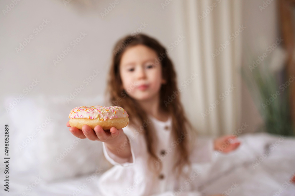 Selective focus on donuts in hand Selective focus on donuts in hand