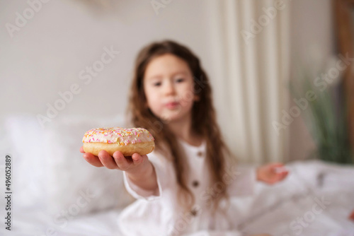 Selective focus on donuts in hand