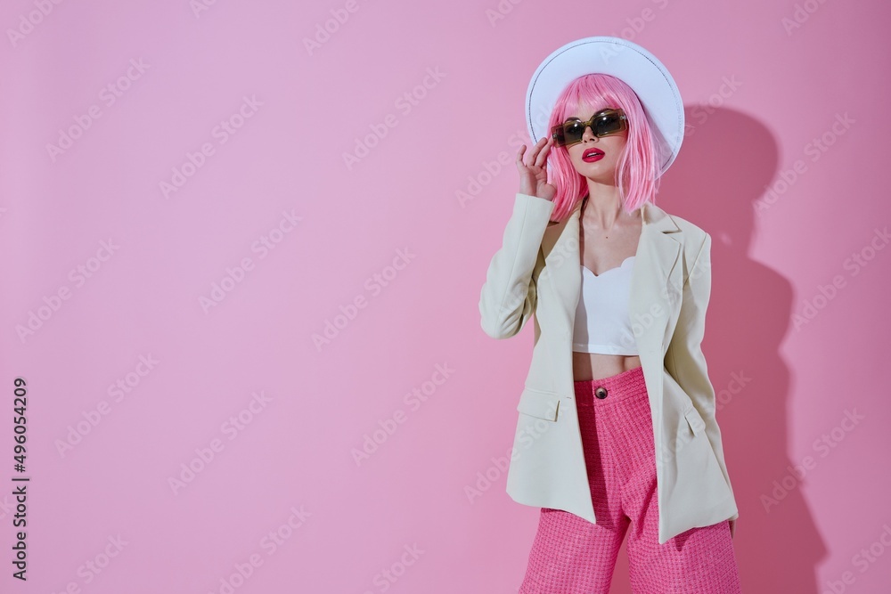 Beautiful fashionable girl hat with sunglasses fashion color background unaltered Beautiful fashionable girl hat with sunglasses fashion color background unaltered