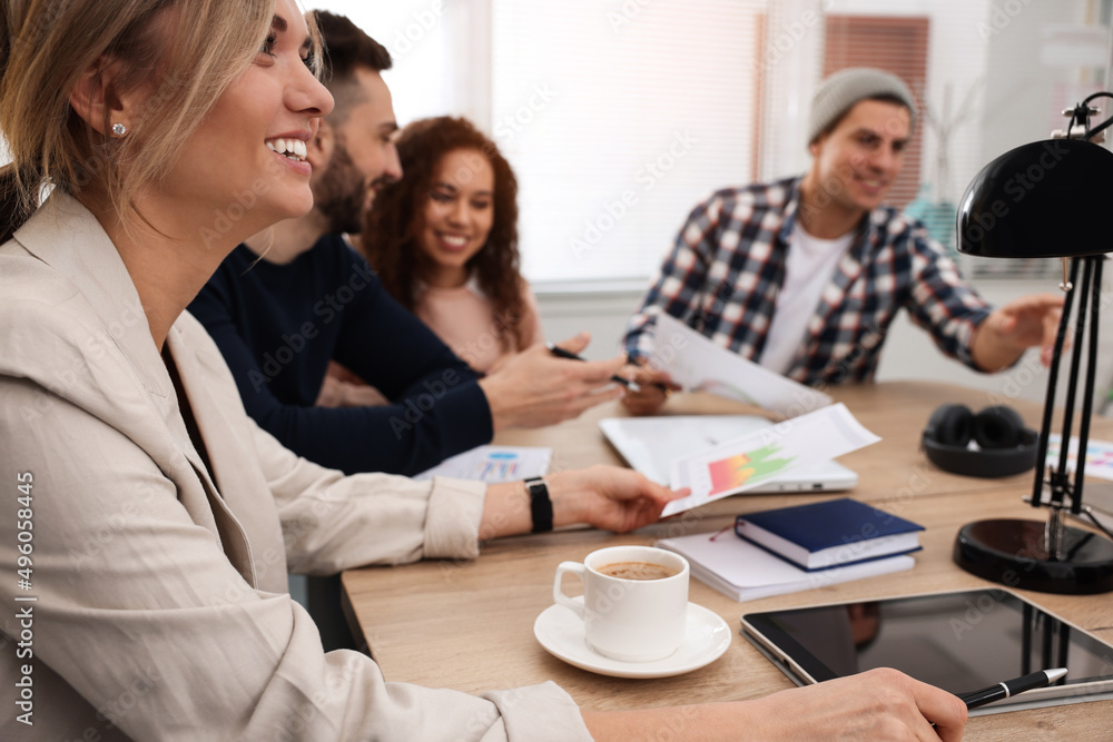 Team of employees working together in office. Startup project Team of employees working together in office. Startup project