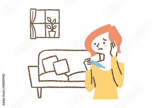 体温計で熱を測る女性_色