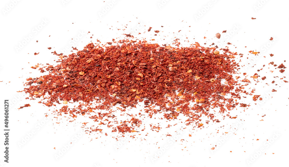 Pile of red pepper flakes on a white background