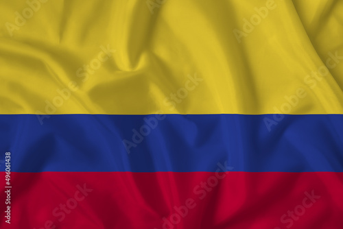 Colombia flag with fabric texture. Close up shot, background