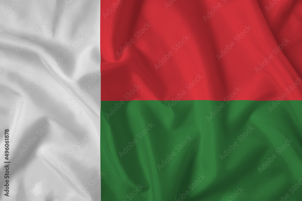 Madagascar flag with fabric texture. Close up shot, background