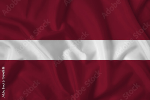 Latvia flag with fabric texture. Close up shot, background Free Download Latvia flag with fabric texture. Close up shot, background - GFXLoad