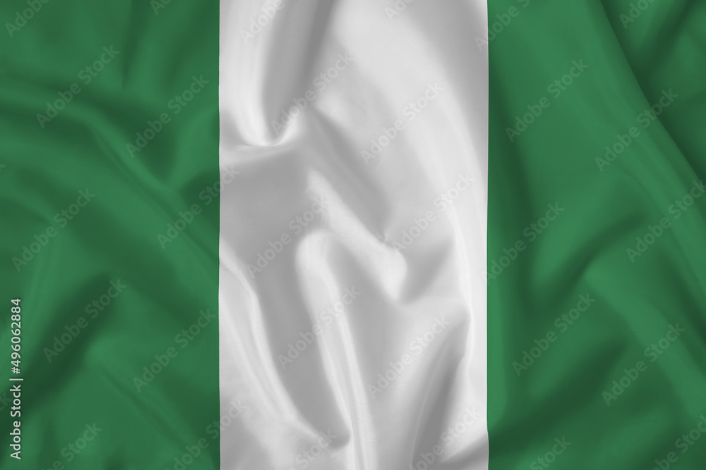 Nigeria flag with fabric texture. Close up shot, background