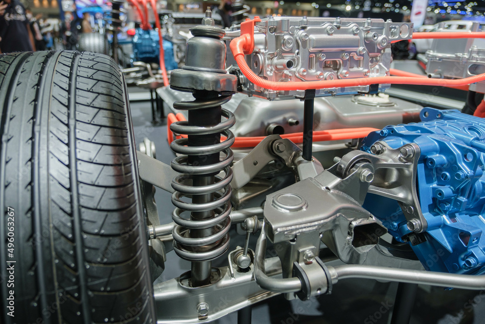 Undercarriage parts of a car, showing materials, wheels, shocks, engines Undercarriage parts of a car, showing materials, wheels, shocks, engines