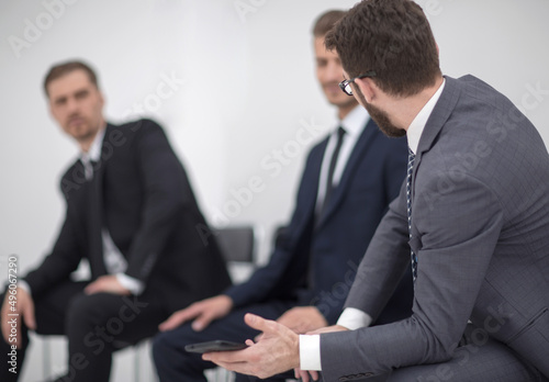 Wallpaper Mural business colleagues sitting in office waiting room Torontodigital.ca