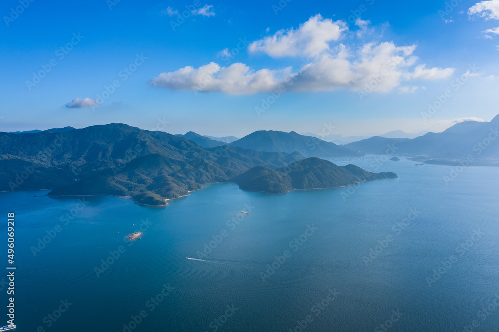 Ships sailing across coast of natural landscape, Near Tolo Channel, Hong Kong