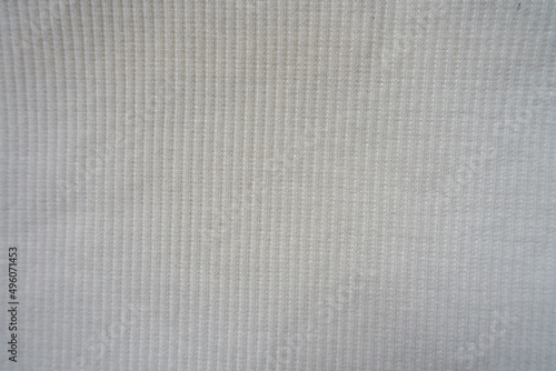 Top view of white cotton and polyester ribbed fabric