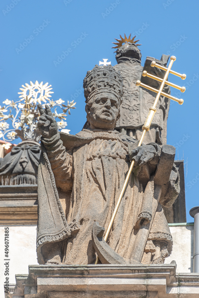 Obraz premium Ancient decorative top facade statues of priests, bishops at Saint Salvator church near Charles Bridge in Prague, Czech Republic, details, closeup