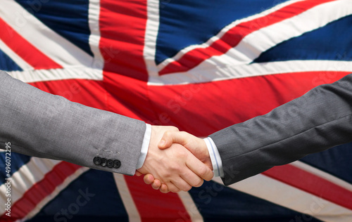 Wallpaper Mural political, business and national concept - close up of handshake over flag of united kingdom on background Torontodigital.ca