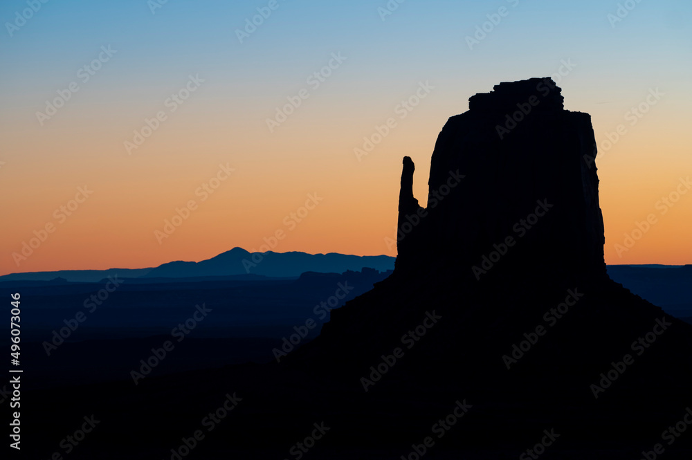 Silhouette of the Mittens Butte during sunrise, Arizona, United States