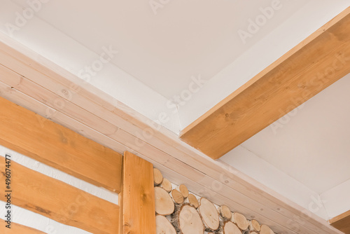 Wooden boards abstract interior plank ceiling design on background of white wall texture