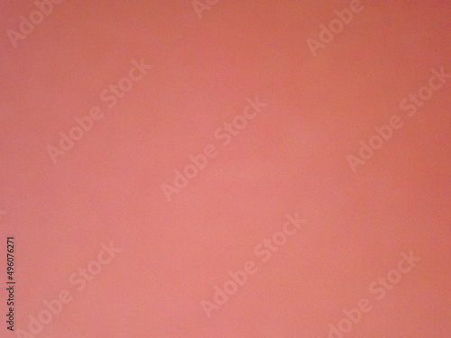 Burgundy, crimson, red, pink paper surface with a clear separation of colors as a background