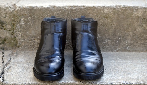 Just polished Shining black man's half boots photo