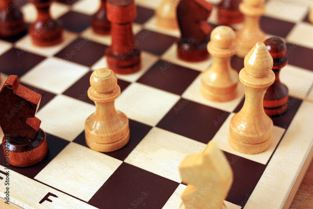 Chess pawn on a chessboard Chess pawn on a chessboard