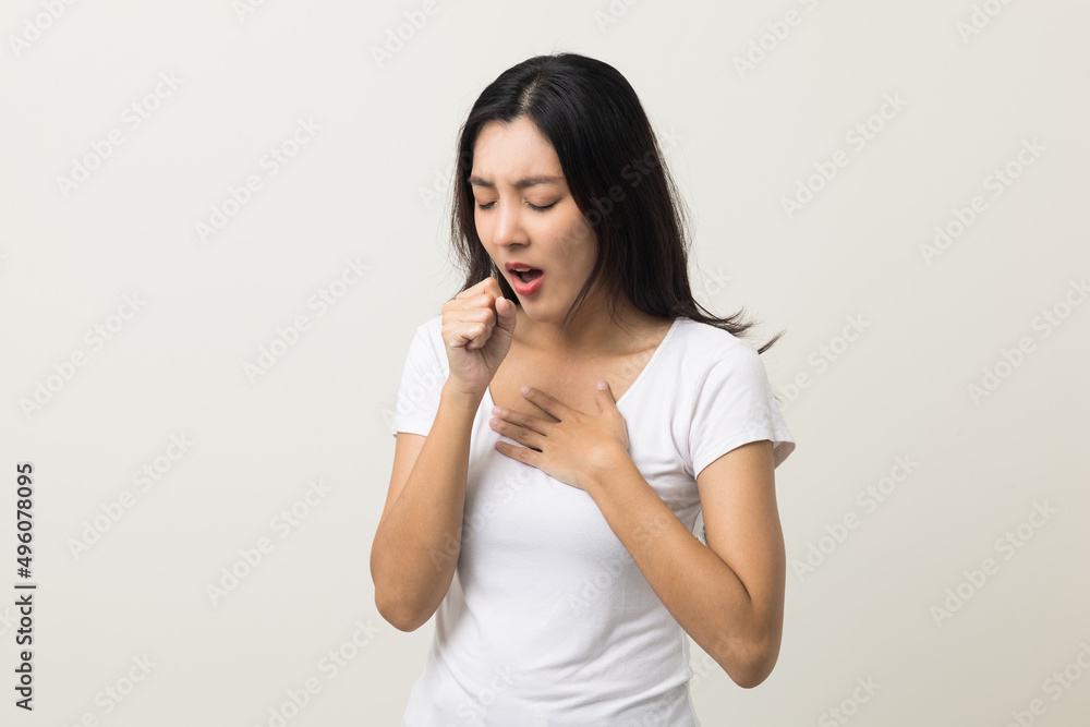 Women have throat irritation, mucus and coughing. Fever headache respiratory tract infection. Female unhealthy Sickness need to consult a doctor and get treatment. On isolated white background. Women have throat irritation, mucus and coughing. Fever headache respiratory tract infection. Female unhealthy Sickness need to consult a doctor and get treatment. On isolated white background.