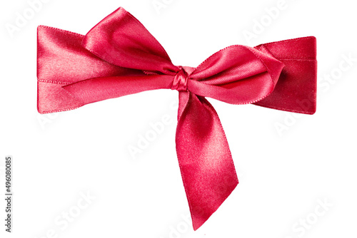 Gift bows. Closeup of a decorative red ribbon bow made of silk for gift box isolated on a white background. Decorations background. Macro photograph.