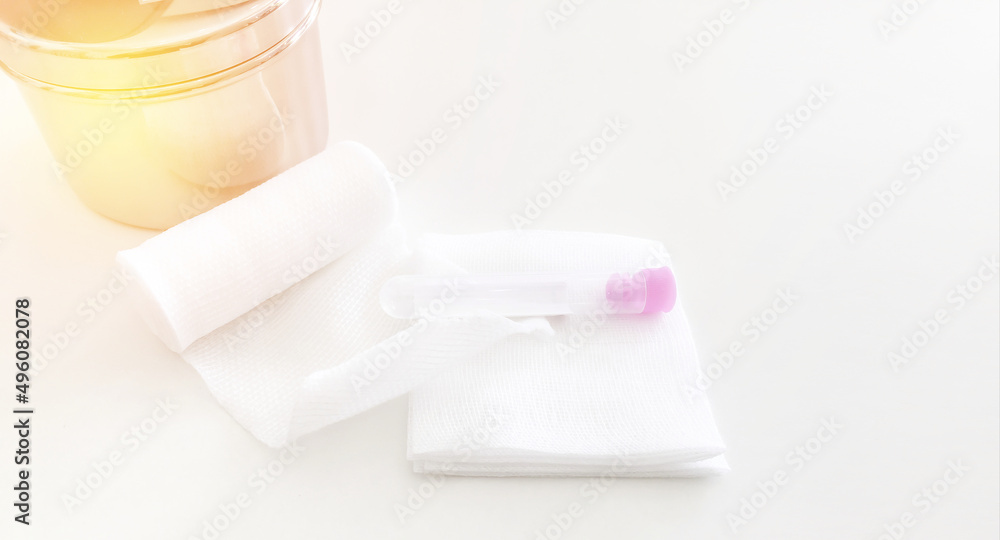 swab ,gauaze ,roll bandage and blood tube with copy space in medical concept swab ,gauaze ,roll bandage and blood tube with copy space in medical concept