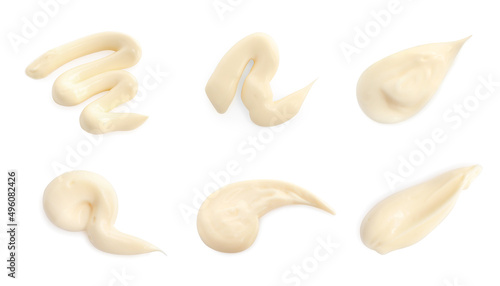 Set with tasty mayonnaise on white background, top view