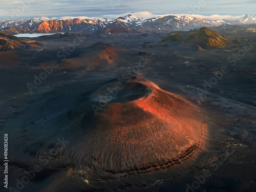 An aerial view of a red crater in the Icelandic highlands.