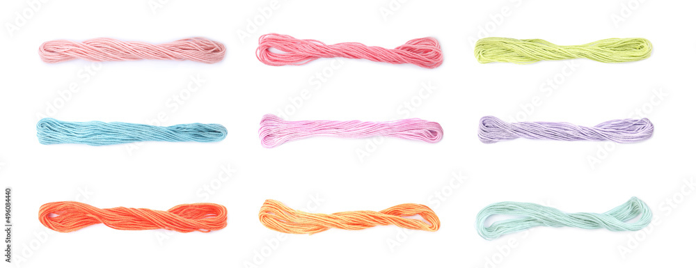 Set with multicolor embroidery threads on white background. Banner design Set with multicolor embroidery threads on white background. Banner design