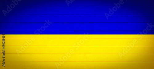 Ukrainian flag background banner panorama - old wooden boards, wood wall texture background, in the colors of the flag of Ukraine photo