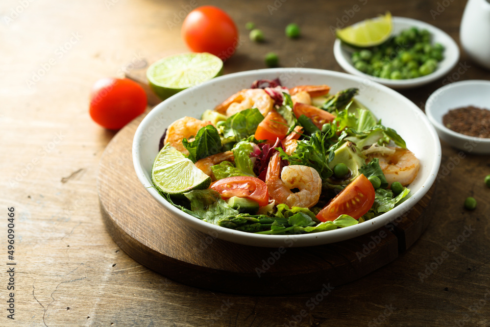 Healthy green salad with shrimps and avocado Healthy green salad with shrimps and avocado