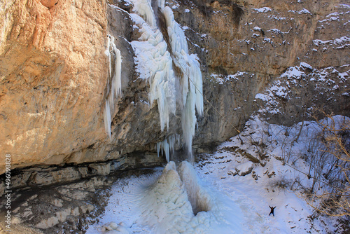 Beautiful frozen Afurja waterfall in the mountains. Afurja village, Guba region, Azerbaijan. photo