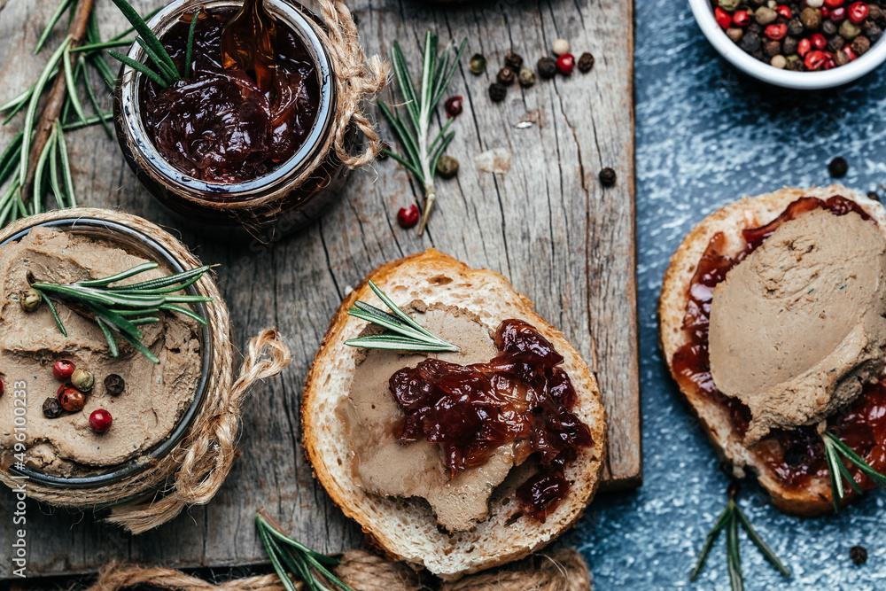 Homemade duck liver pate with red onion jam. Gourmet appetizers, Assorted Italian appetizer bruschetta. banner, menu, recipe place for text, top view Homemade duck liver pate with red onion jam. Gourmet appetizers, Assorted Italian appetizer bruschetta. banner, menu, recipe place for text, top view