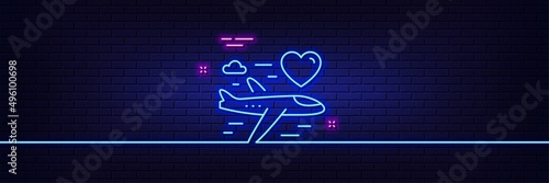 Neon light glow effect. Honeymoon travel line icon. Love trip sign. Valentines day flight symbol. 3d line neon glow icon. Brick wall banner. Honeymoon travel outline. Vector