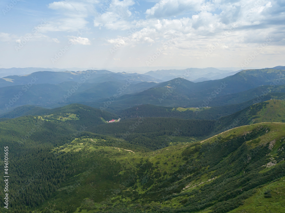 Naklejka premium High mountains of the Ukrainian Carpathians in cloudy weather. Aerial drone view.