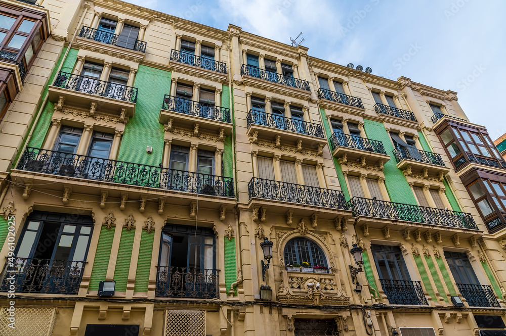 A view of building balconies in the centre of Alicante on a spring day