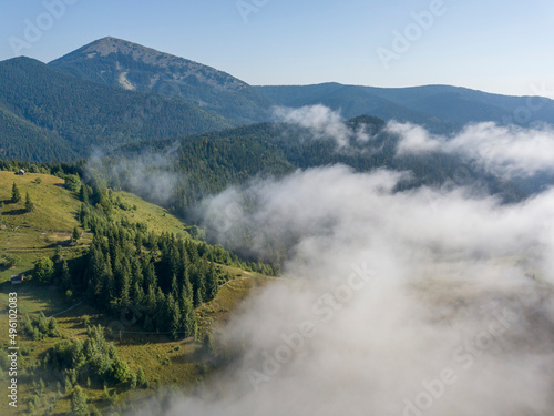 Morning fog in the Ukrainian Carpathians. Aerial drone view.