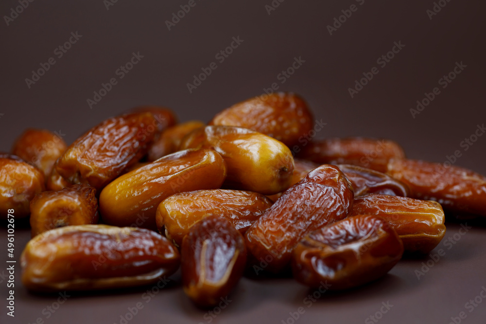 A bunch of ripe dried dates. Dried dates. A bunch of ripe dried dates. Dried dates.