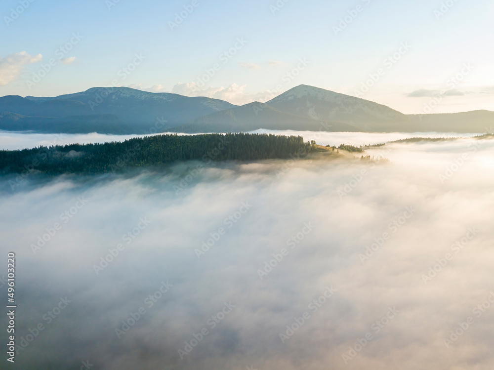 Morning fog in the Ukrainian Carpathians. Aerial drone view.