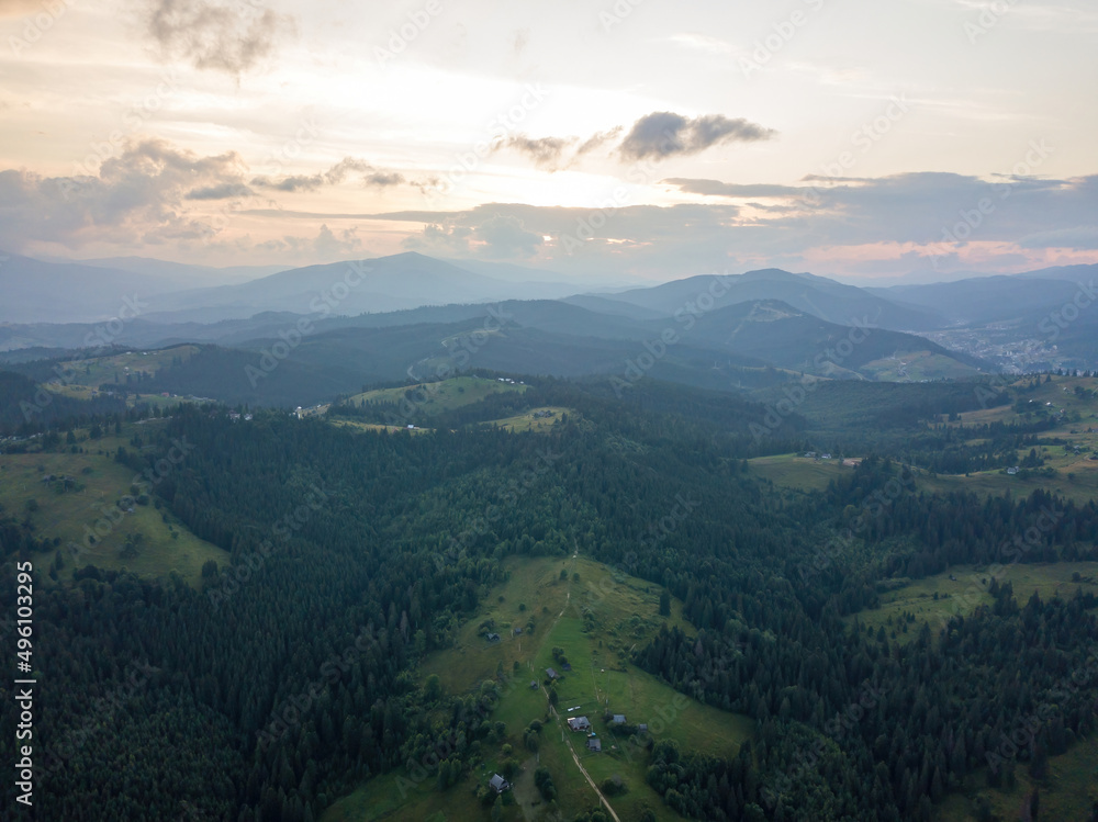 Sunset over the mountains in the Ukrainian Carpathians. Evening. Aerial drone view.