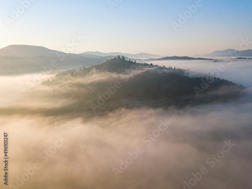 Morning fog in the Ukrainian Carpathians. Aerial drone view.