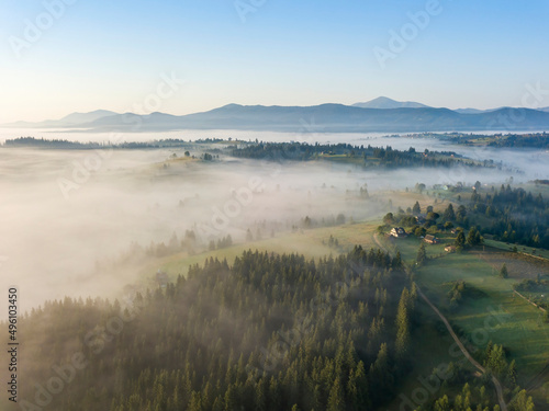 Morning fog in the Ukrainian Carpathians. Aerial drone view.