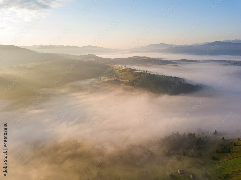 Green mountains of the Ukrainian Carpathians in the morning mist. Aerial drone view. Green mountains of the Ukrainian Carpathians in the morning mist. Aerial drone view.