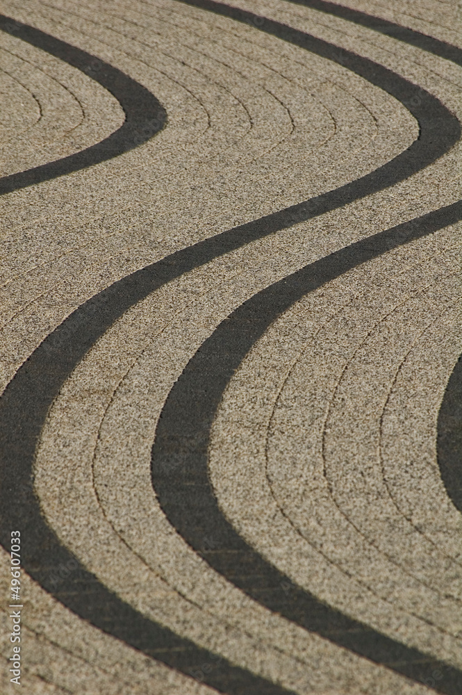 Naklejka premium Decorative sidewalk with curved lines.