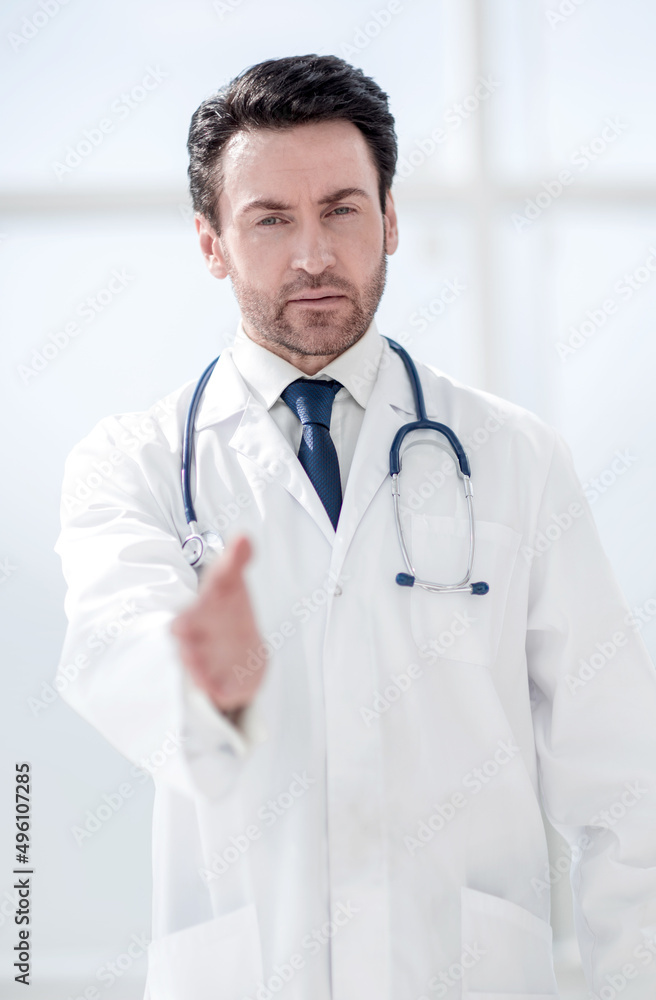 background image of the doctor holding out his hand for greeting background image of the doctor holding out his hand for greeting