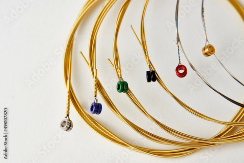 New guitar string on white background