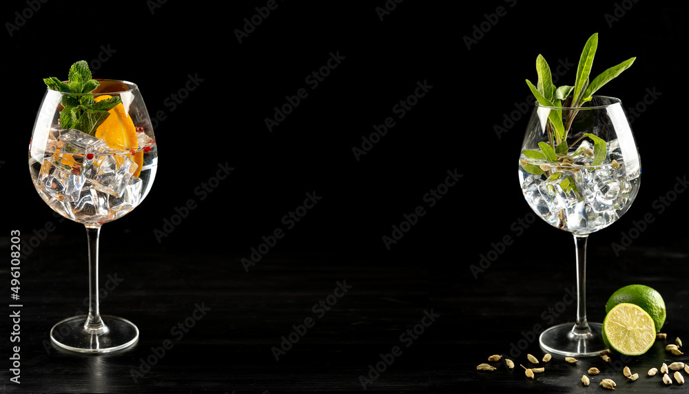 Modern Cocktail gin tonic herb spices fishbowl glass plain background