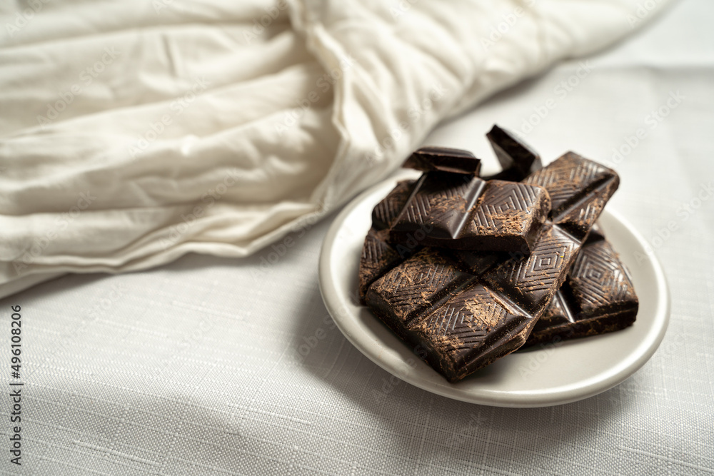 random pieces of quality dark chocolate with space