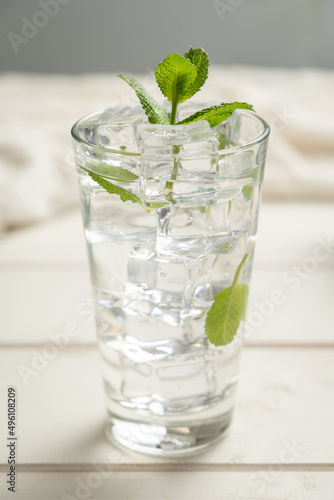 Obraz na płótnie Fresh glass of soda water garnish herb w salonie