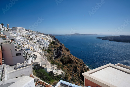 Panoramic view of the famous village Fira  the volcano Nea Kameni and the Aegean Sea in Santorini